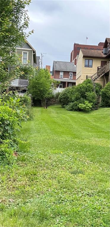 115 Alwine Avenue Greensburg, PA 15601 - Photo 1 of 2 a house view with a garden space