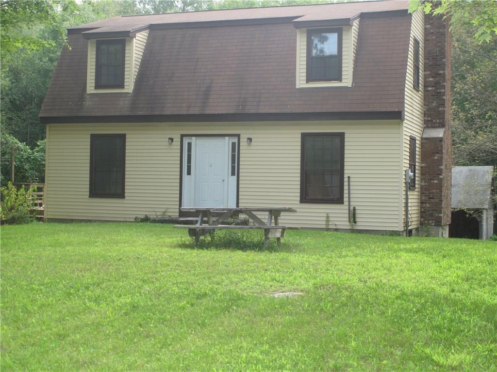 a front view of house with yard