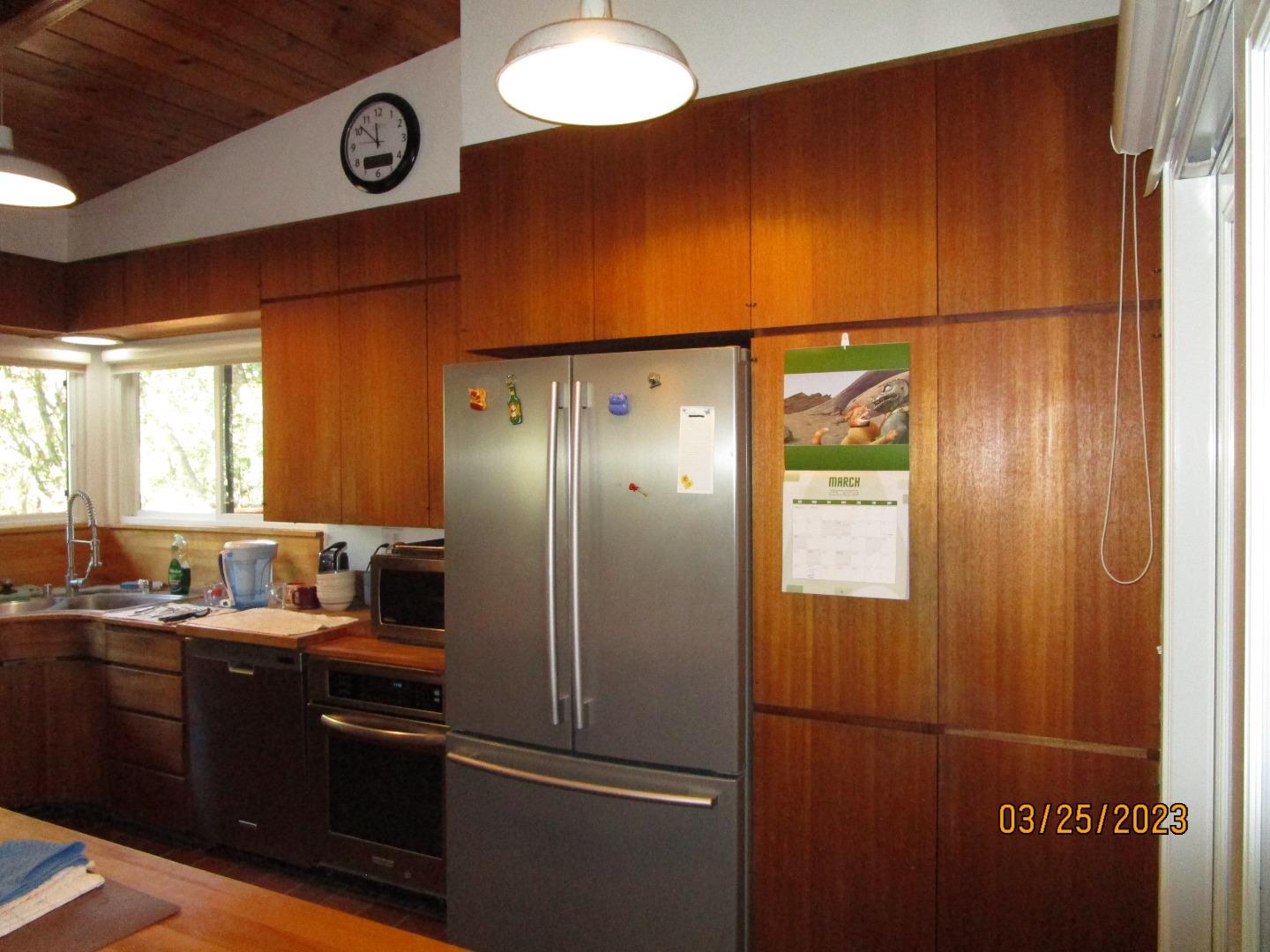 225 View Court Aptos, CA 95003 - Photo 11 of 39 a kitchen with a refrigerator and a sink