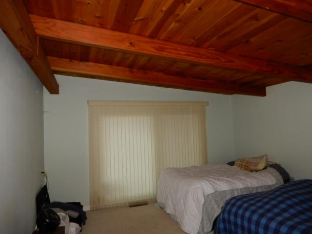 225 View Court Aptos, CA 95003 - Photo 26 of 39 a bedroom with a bed and a dresser