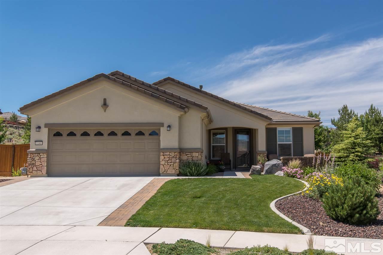 1180 Callaway Trail Reno, NV 89523 - Photo 1 of 19 a front view of a house with a garden and yard