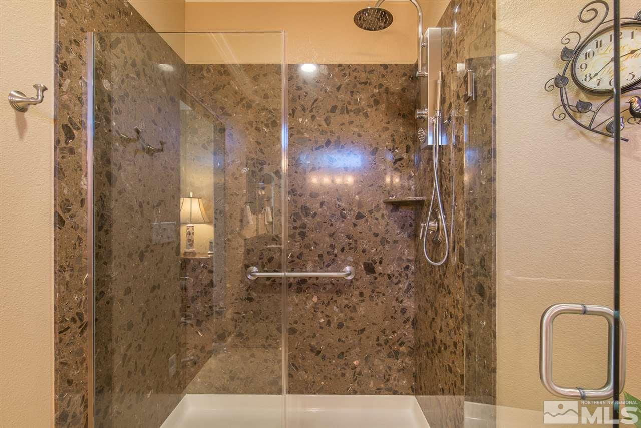 1180 Callaway Trail Reno, NV 89523 - Photo 12 of 19 a bathroom with a shower