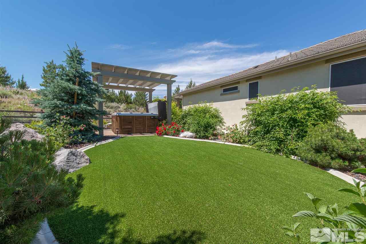 1180 Callaway Trail Reno, NV 89523 - Photo 18 of 19 a view of a house with a yard