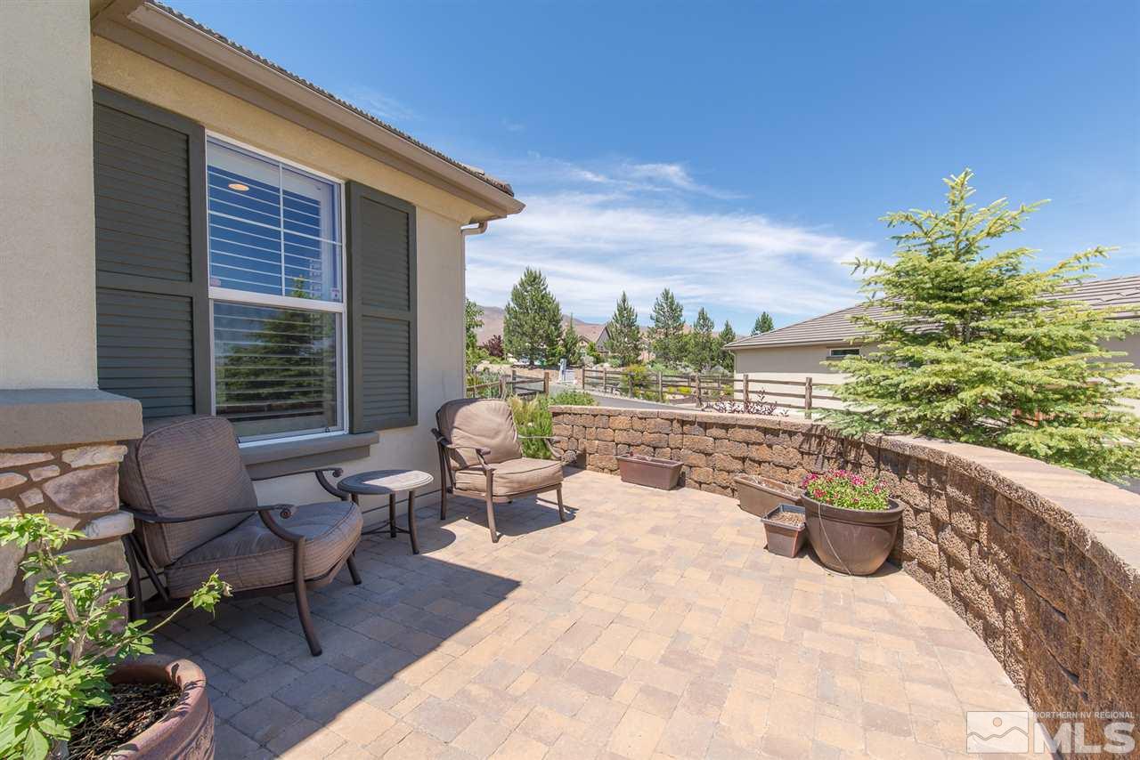 1180 Callaway Trail Reno, NV 89523 - Photo 2 of 19 a bench sitting in front of a building