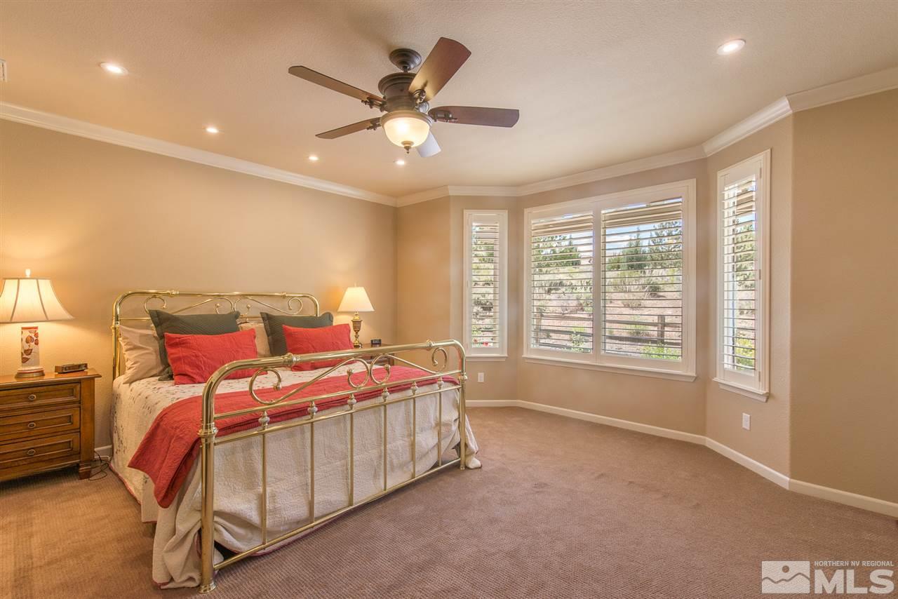 1180 Callaway Trail Reno, NV 89523 - Photo 10 of 19 a bedroom with a bed and window