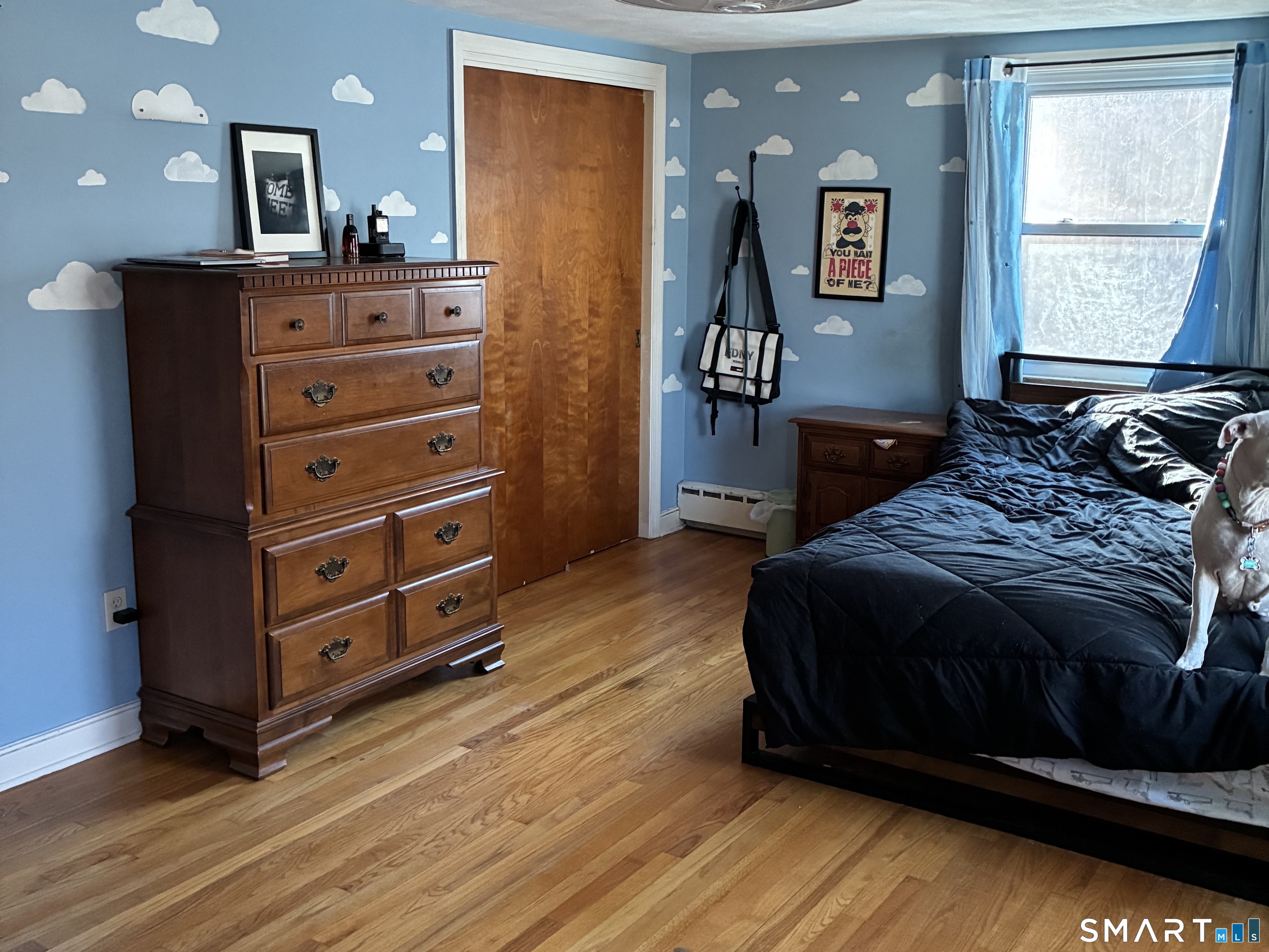 52 Alger Road East Haddam, CT 06423 - Photo 17 of 34 a bedroom with a bed and wooden floor