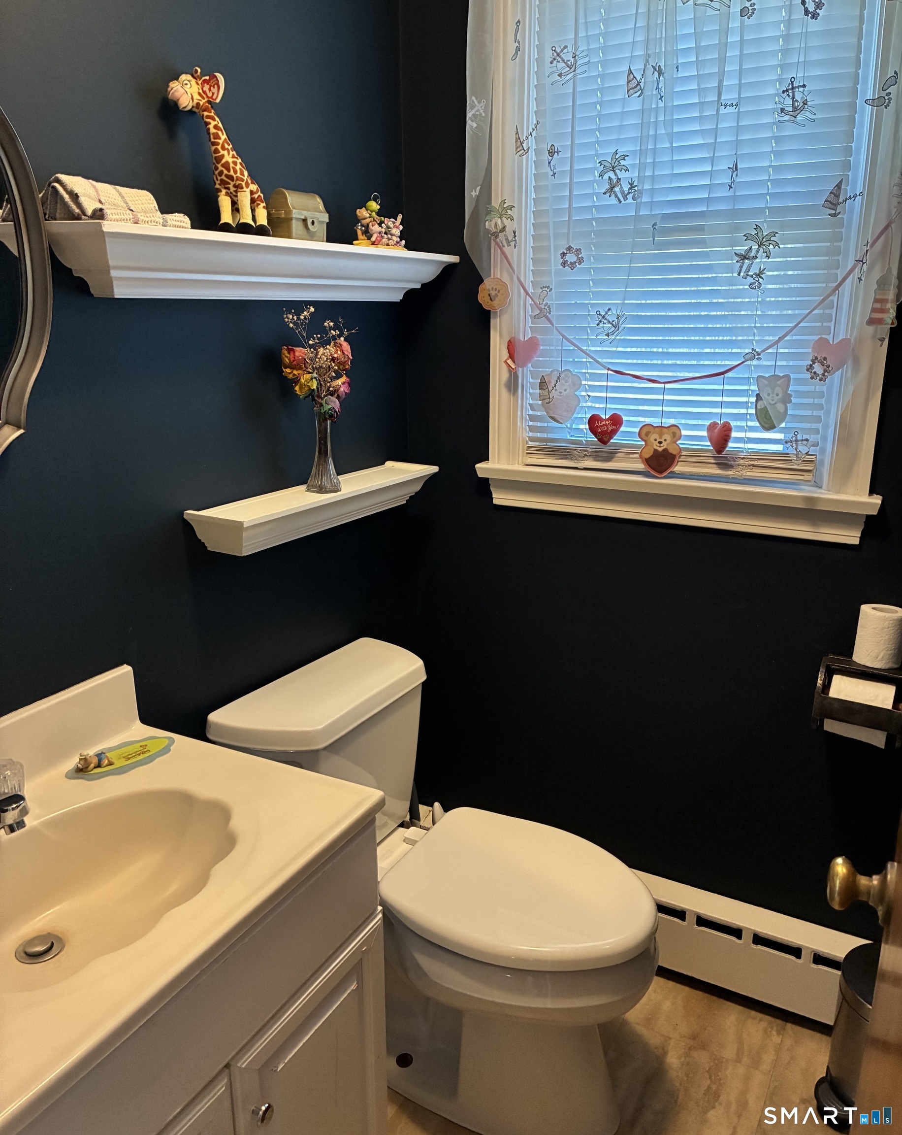 52 Alger Road East Haddam, CT 06423 - Photo 26 of 34 a bathroom with a toilet and a sink