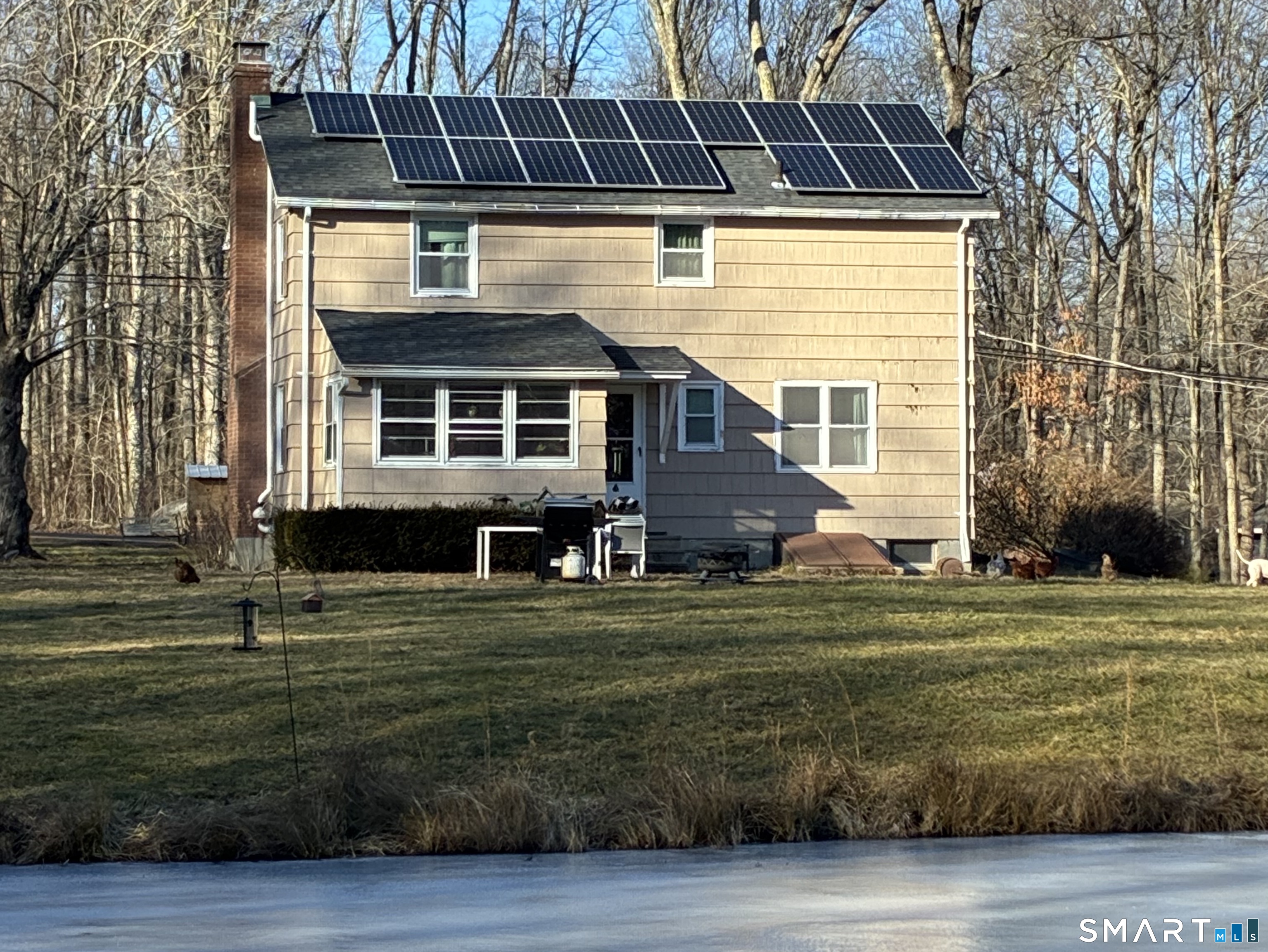 52 Alger Road East Haddam, CT 06423 - Photo 27 of 34 a front view of a house with a yard