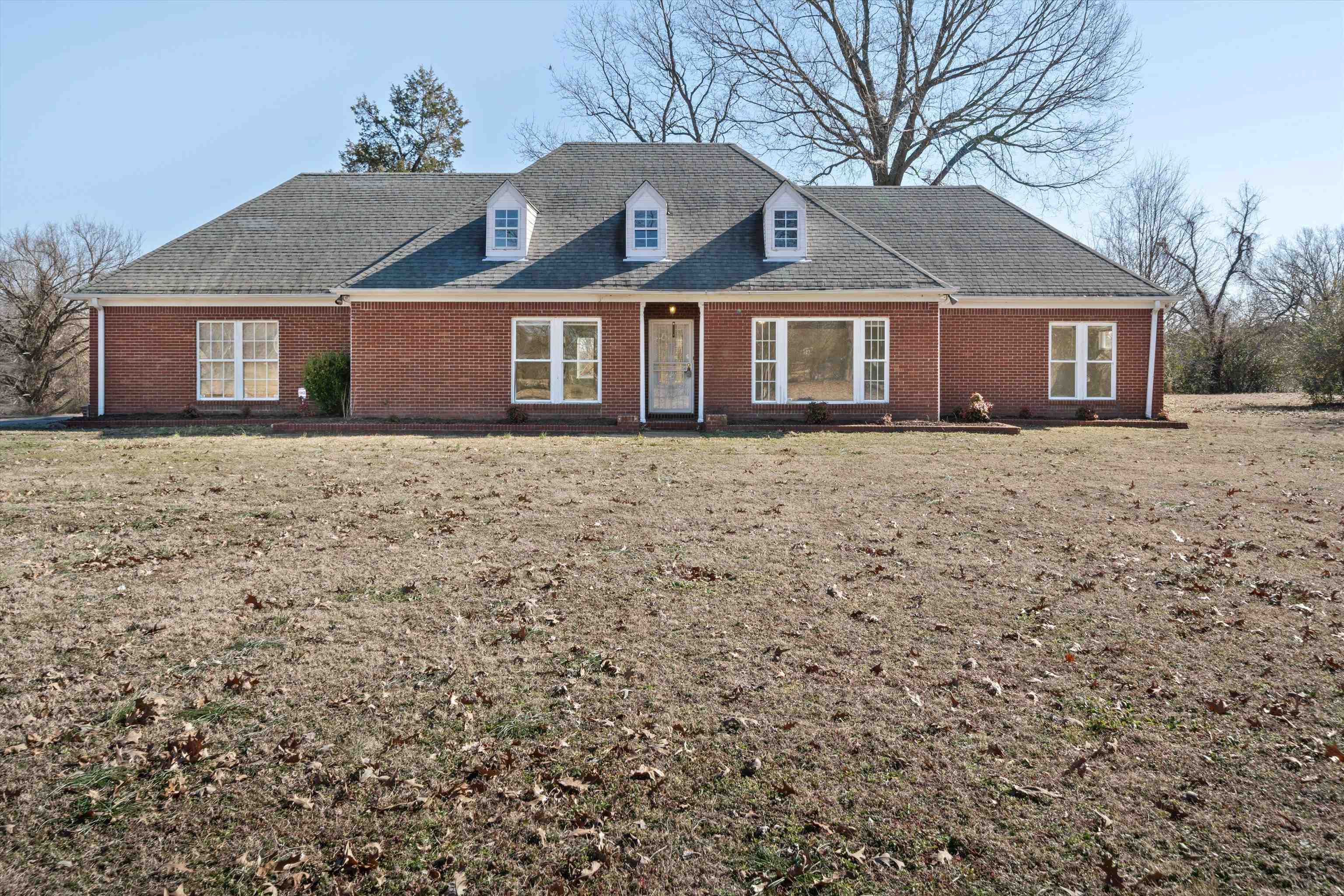 130 Belmont Road Mason, TN 38049 - Photo 2 of 24 Cape cod house with a front lawn