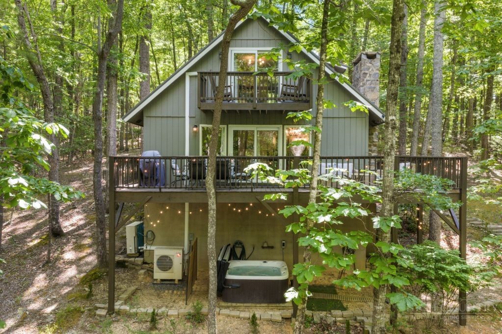 216 Saddle Lane Deep Gap, NC 28618 - Photo 2 of 44 a front view of a house with a yard