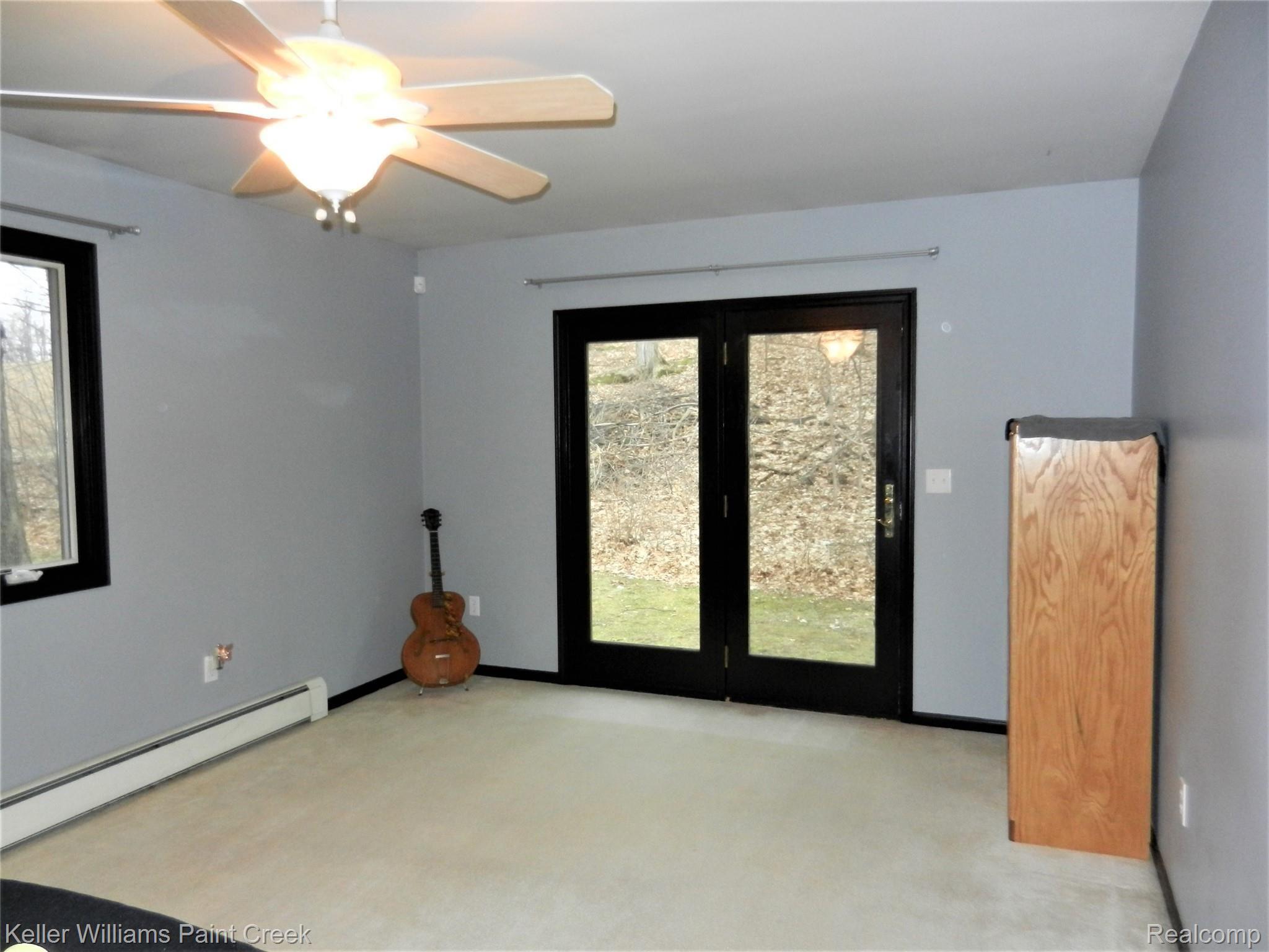 3396 Hasler Lake Road Lapeer, MI 48446 - Photo 16 of 24 Master with french doors to back yard.jpg