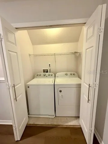 a utility room with dryer and washer