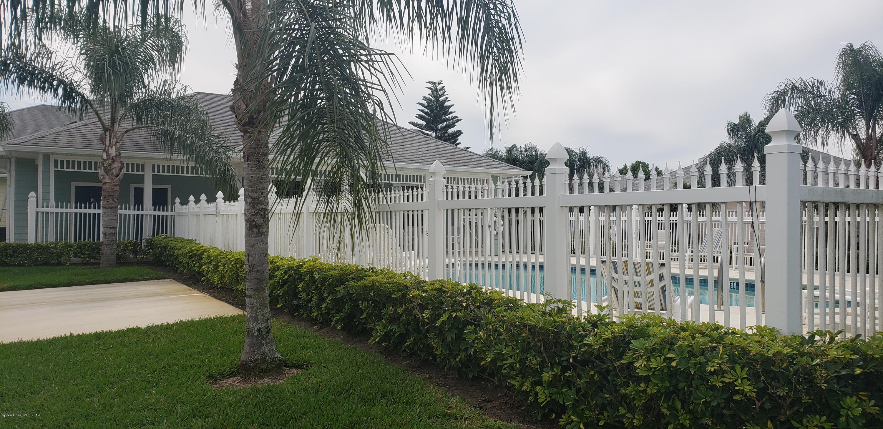 1050 Eleuthera Drive Northeast Palm Bay, FL 32905 - Photo 8 of 12 COMMUNITY POOL AND CLUBHOUSE
