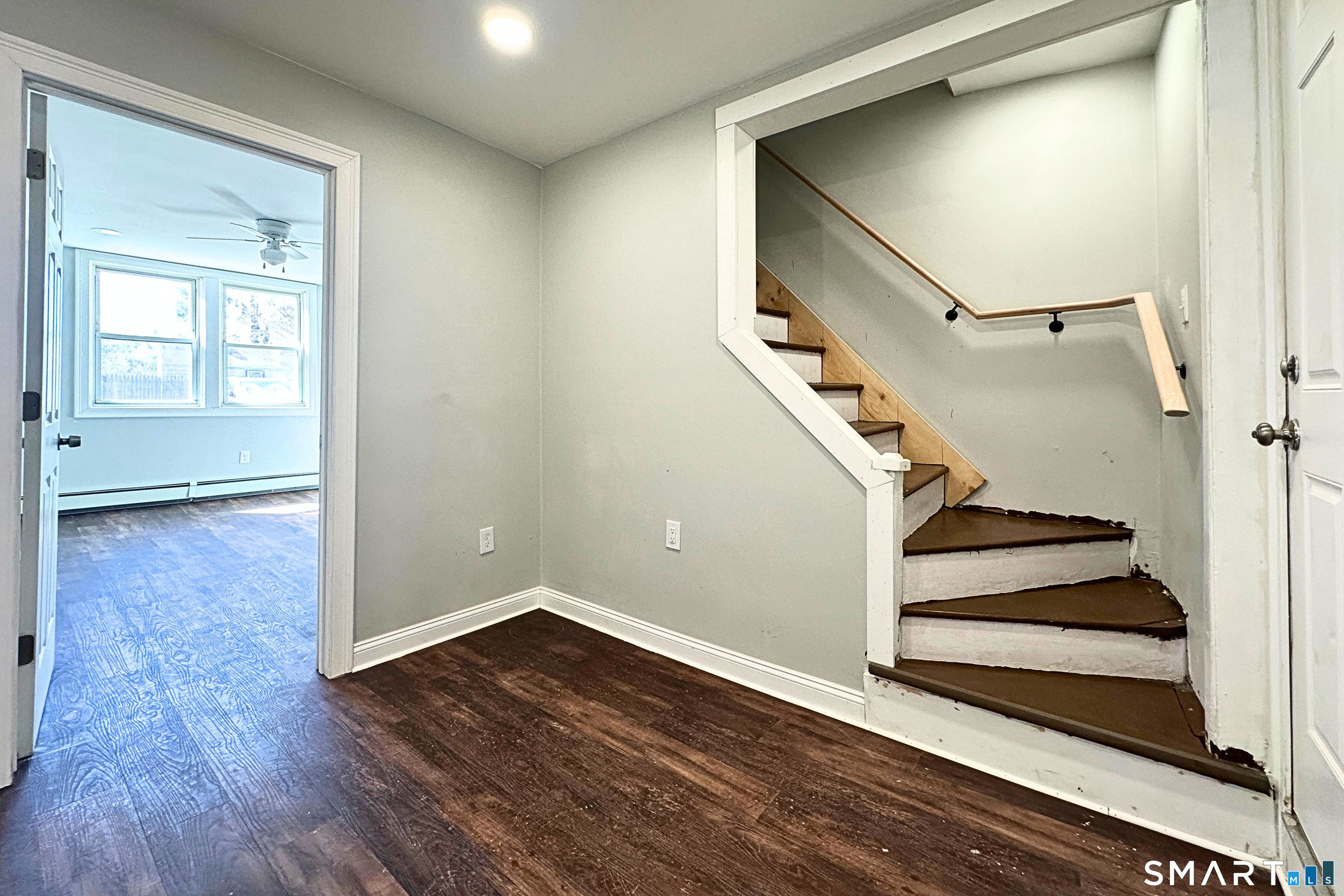 88 Taftville-Occum Road, Unit C Norwich, CT 06360 - Photo 12 of 28 a view of entryway with wooden floor