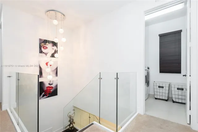 a view of a hallway with workspace and electric equipment