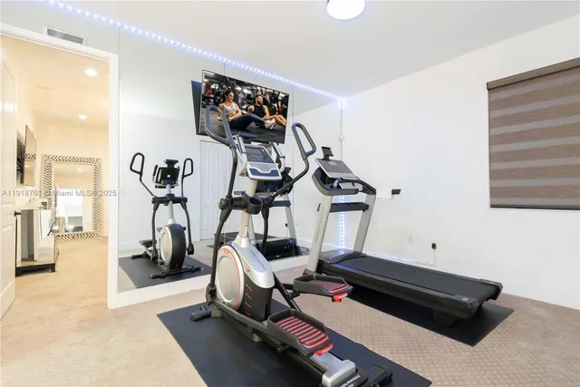 a view of a room with gym equipment