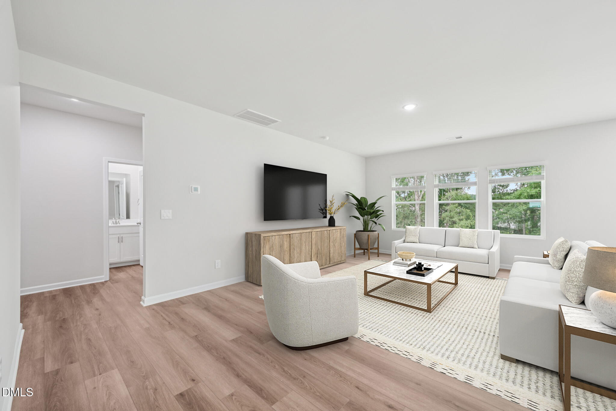 1454 Hatteras Road Durham, NC 27703 - Photo 12 of 53 a living room with furniture and a flat screen tv