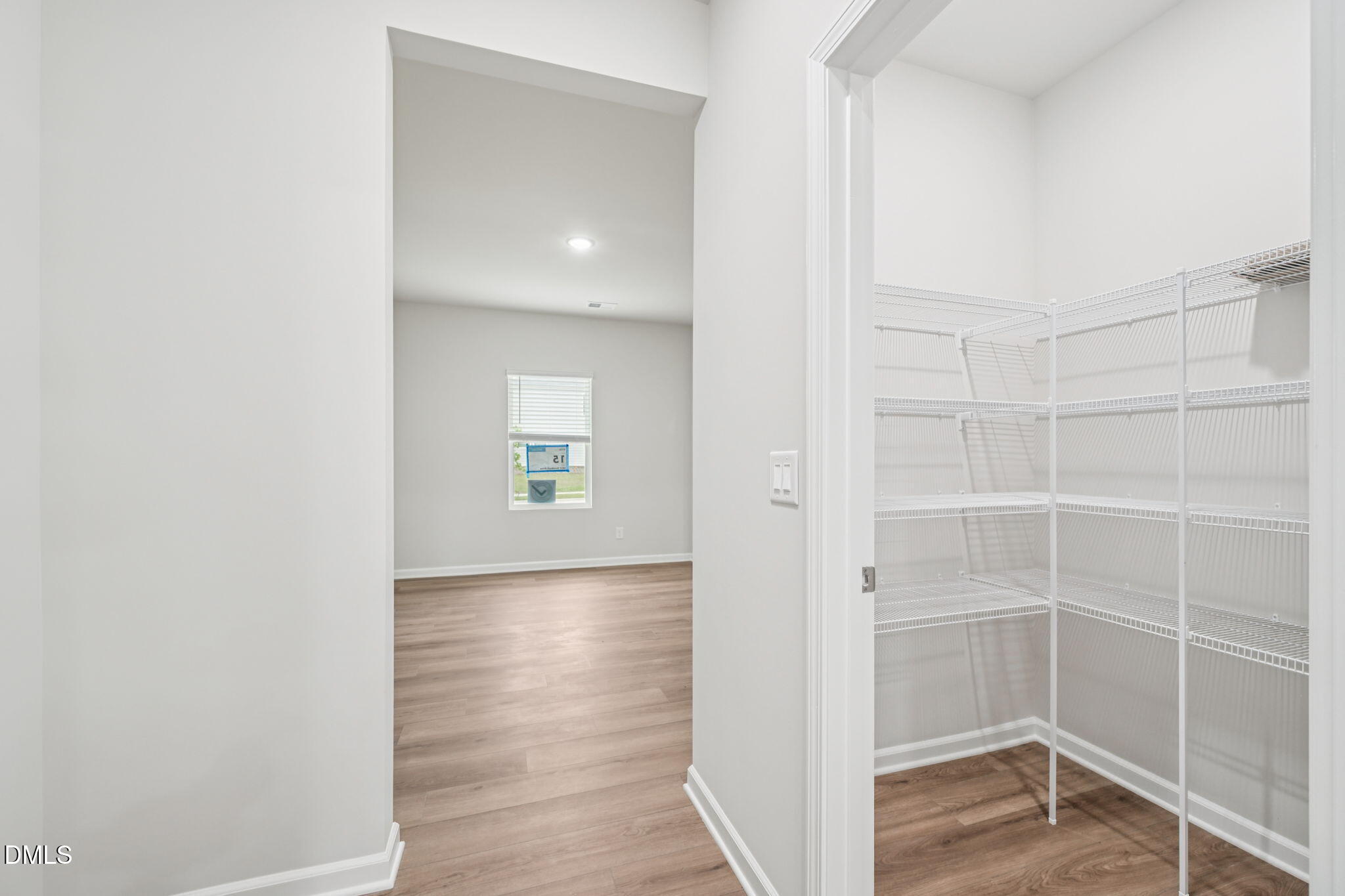 1454 Hatteras Road Durham, NC 27703 - Photo 23 of 53 a view of a room with wooden floor