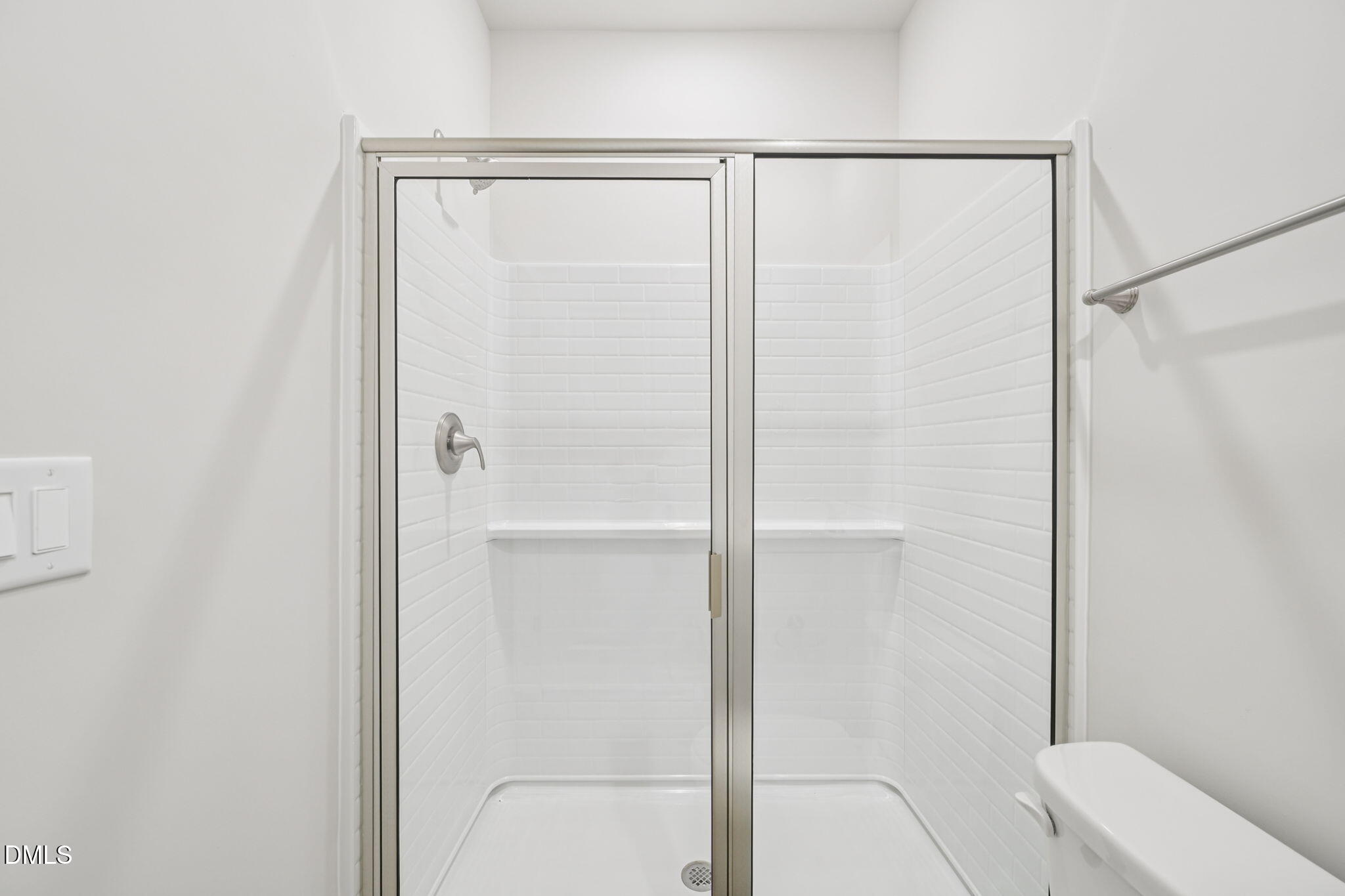 1454 Hatteras Road Durham, NC 27703 - Photo 25 of 53 a bathroom with a shower and a toilet