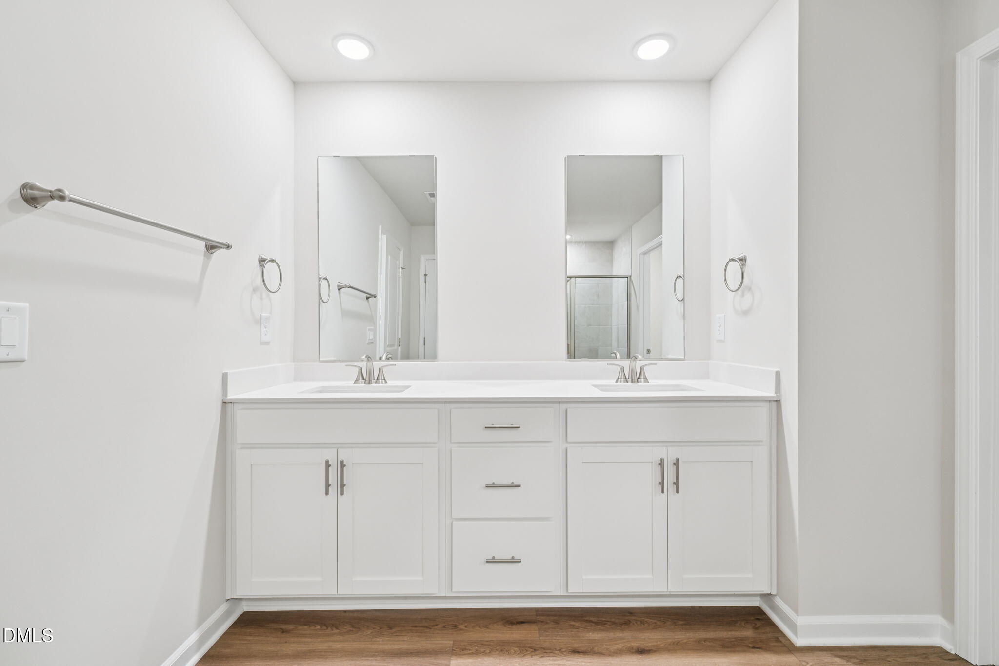 1454 Hatteras Road Durham, NC 27703 - Photo 40 of 53 a bathroom with a sink and a mirror