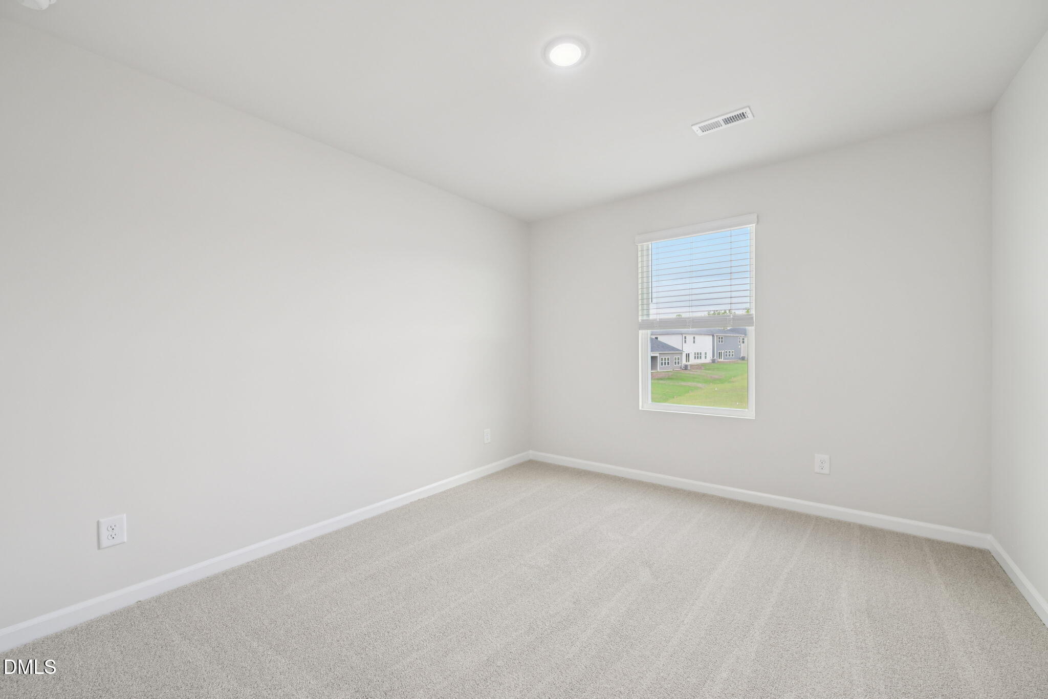 1454 Hatteras Road Durham, NC 27703 - Photo 44 of 53 an empty room with windows