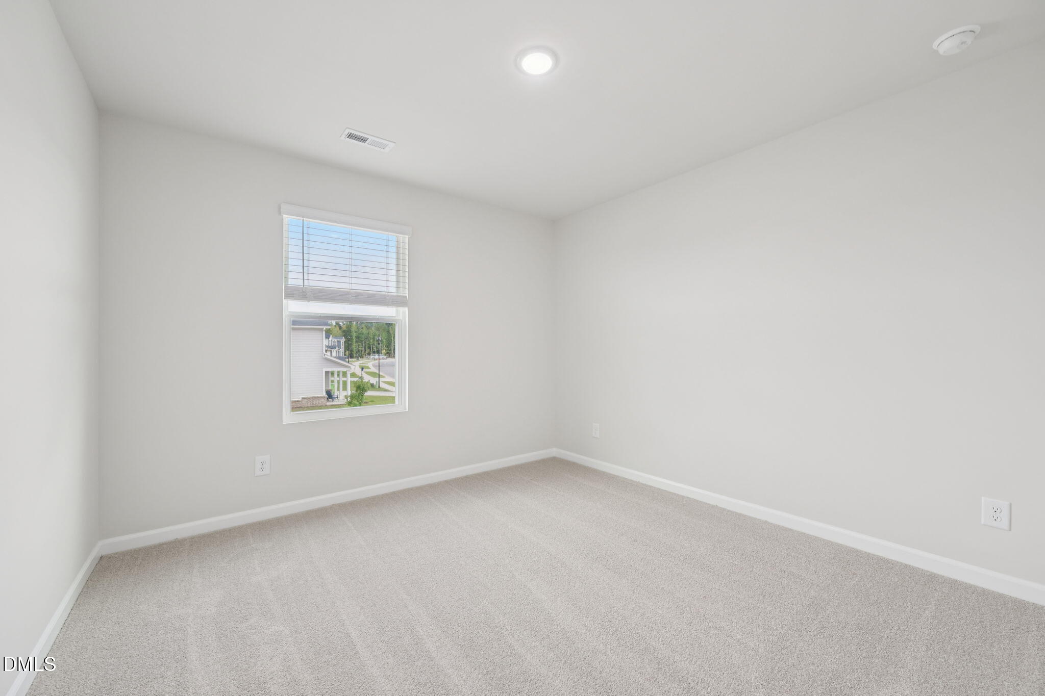 1454 Hatteras Road Durham, NC 27703 - Photo 49 of 53 an empty room with a window