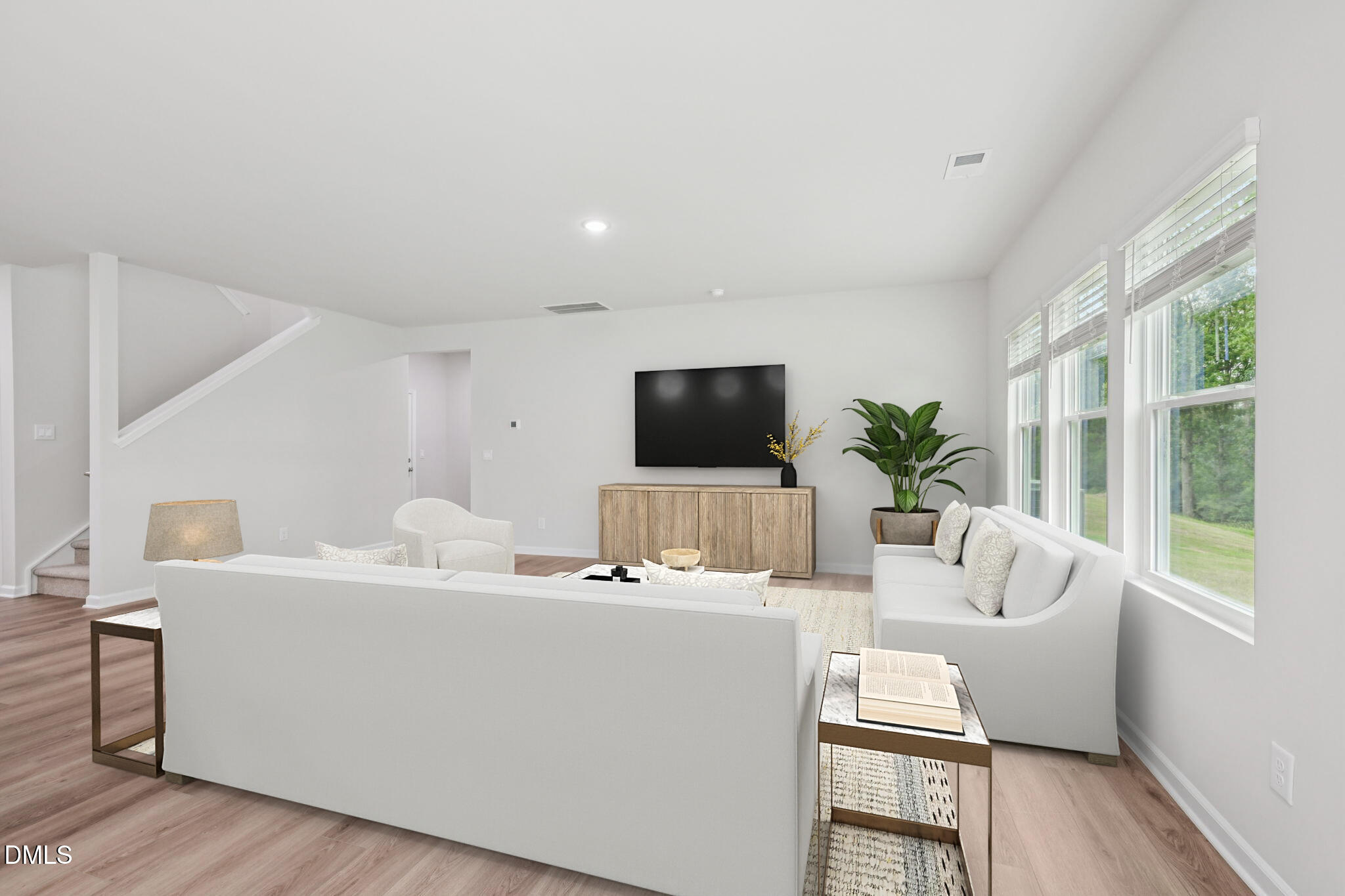 1454 Hatteras Road Durham, NC 27703 - Photo 8 of 53 a living room with furniture and a flat screen tv