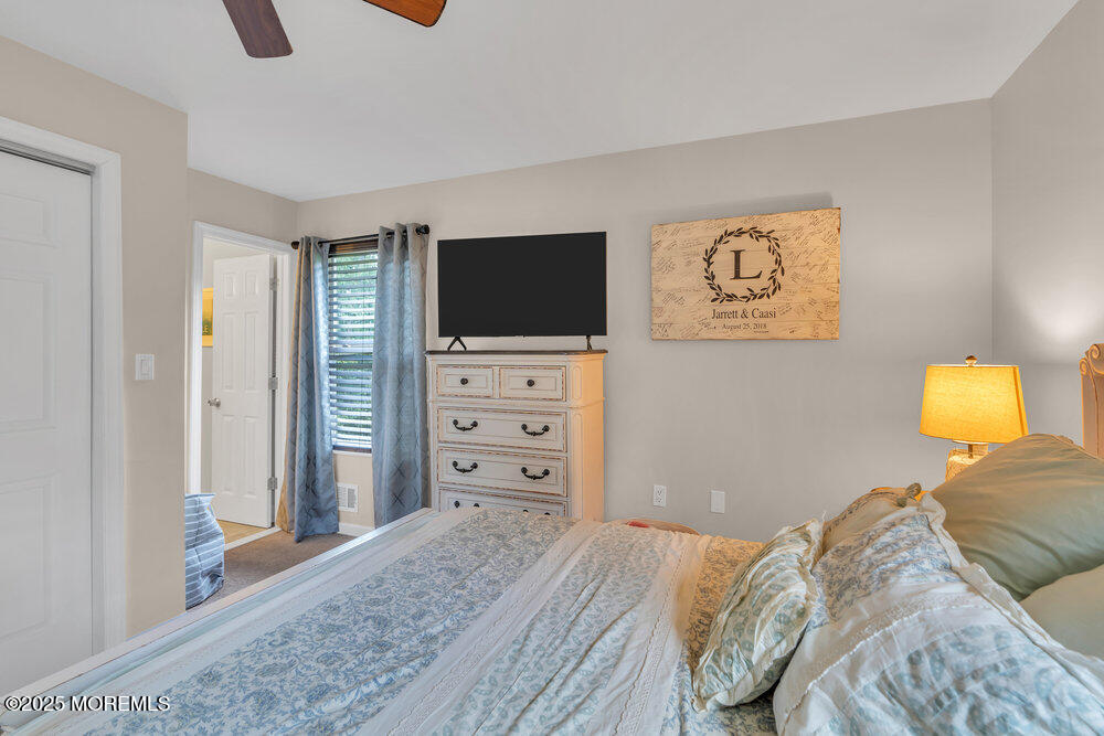 375 South Stump Tavern Road Jackson, NJ 08527 - Photo 20 of 34 a bedroom with a bed and television