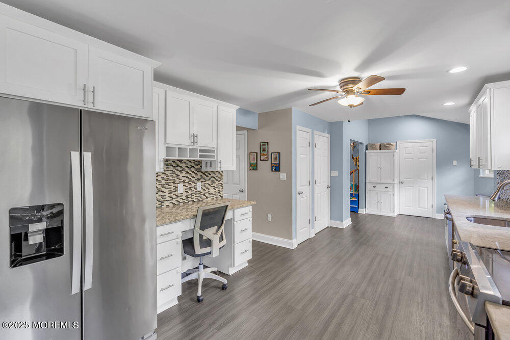375 South Stump Tavern Road Jackson, NJ 08527 - Photo 7 of 34 a view of a kitchen with furniture and a ceiling fan