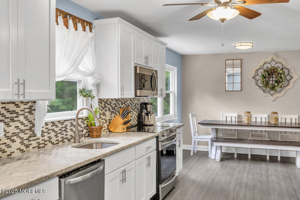 375 South Stump Tavern Road Jackson, NJ 08527 - Photo 9 of 34 a kitchen with a sink cabinets and window