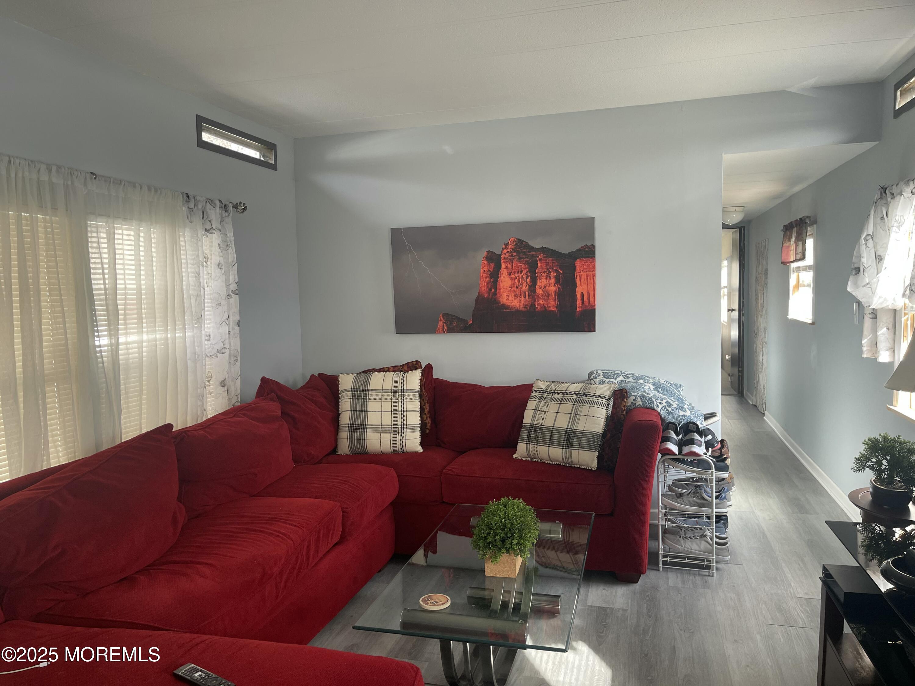 54 Alissa Terrace Jackson, NJ 08527 - Photo 4 of 13 a living room with furniture and wooden floor