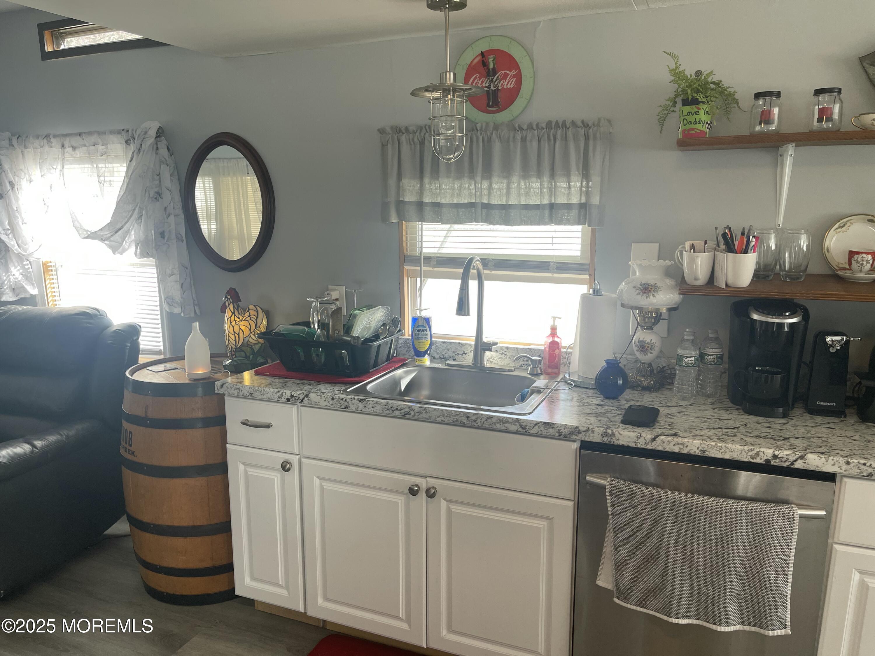54 Alissa Terrace Jackson, NJ 08527 - Photo 6 of 13 a kitchen with a sink and a cabinets