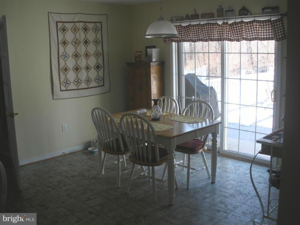 Kitchen features sunny breakfast area