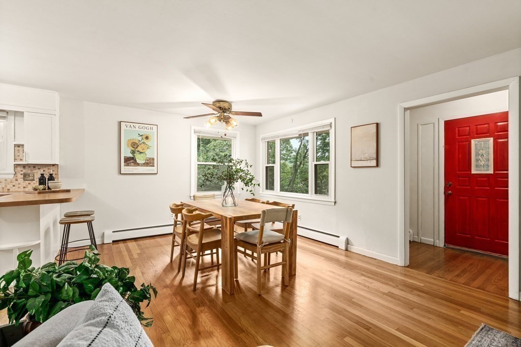 3 Wilson Street Worcester, MA 01604 - Photo 11 of 42 a view of a dining room with furniture window and wooden floor