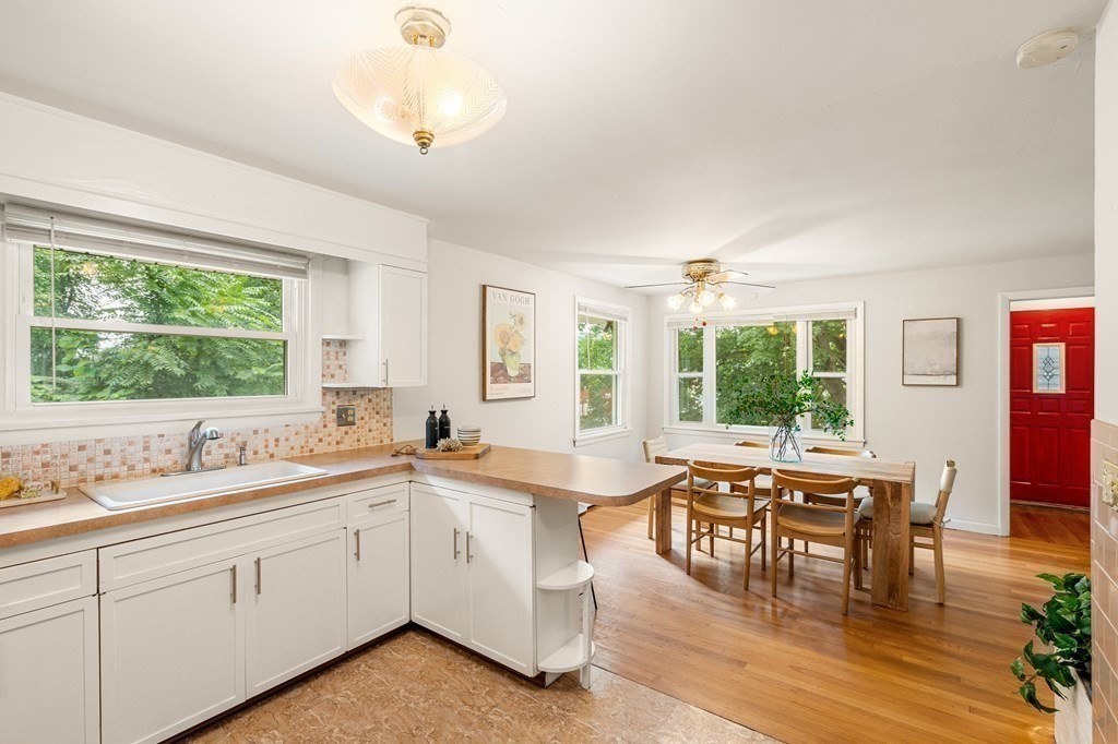 3 Wilson Street Worcester, MA 01604 - Photo 17 of 42 a kitchen with sink cabinets and dining table view