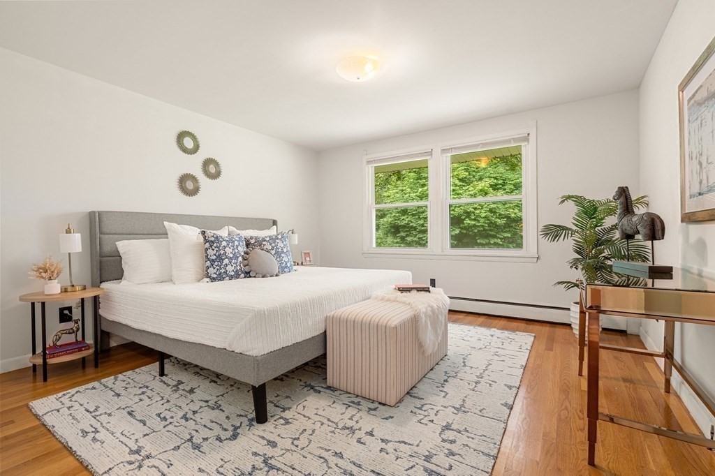 3 Wilson Street Worcester, MA 01604 - Photo 18 of 42 a bedroom with a bed and a large window