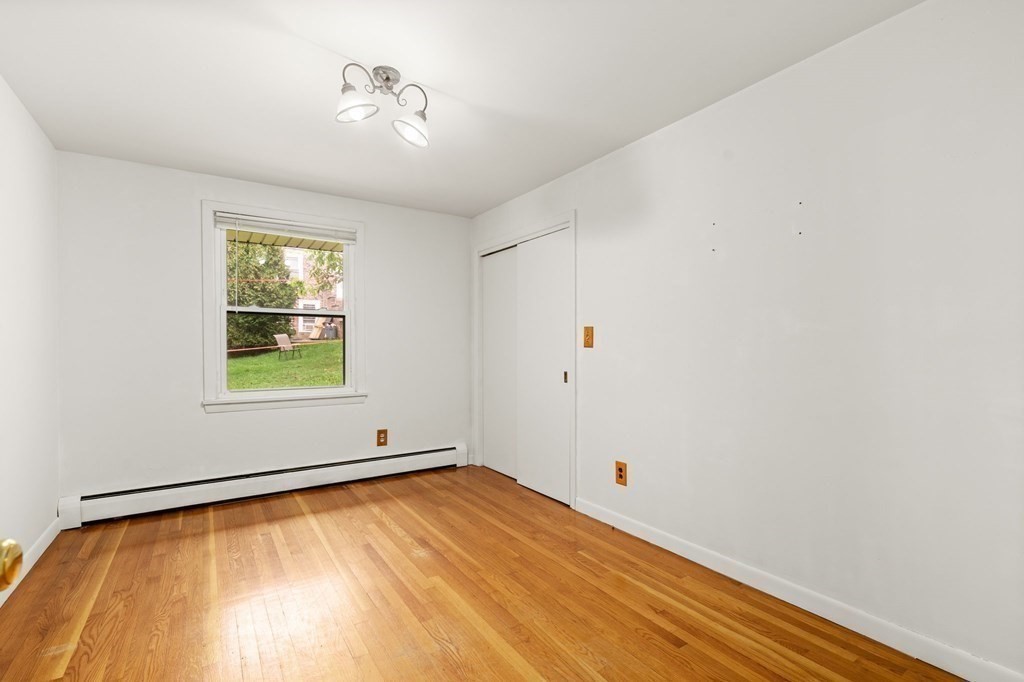 3 Wilson Street Worcester, MA 01604 - Photo 20 of 42 a view of empty room with window and ceiling fan