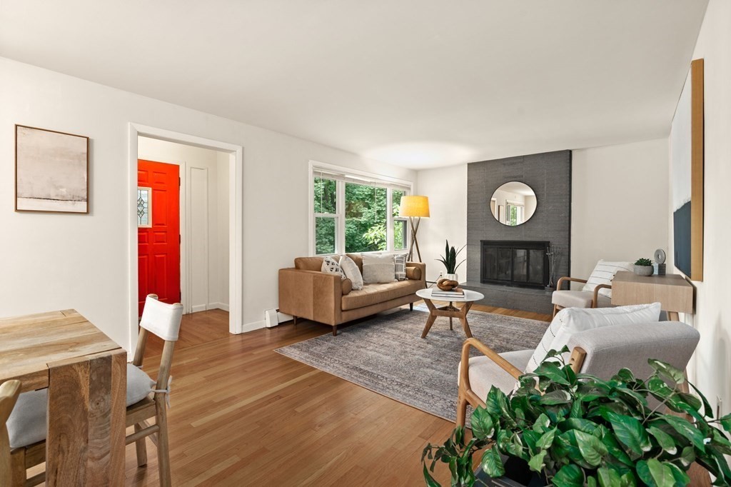 3 Wilson Street Worcester, MA 01604 - Photo 2 of 42 a living room with furniture and a fireplace