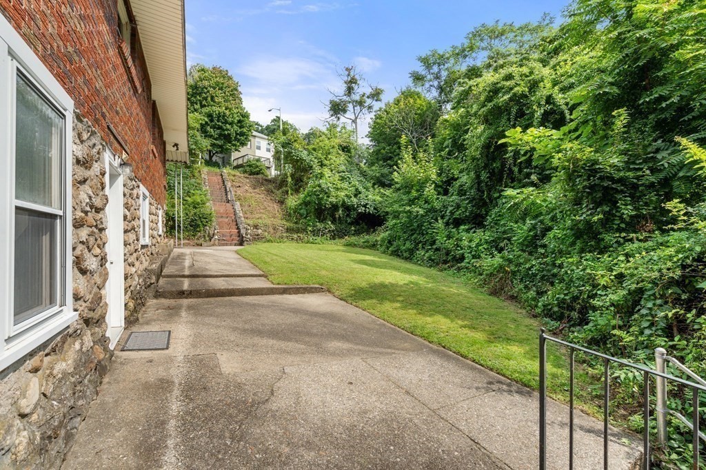 3 Wilson Street Worcester, MA 01604 - Photo 36 of 42 a view of yard with pathway