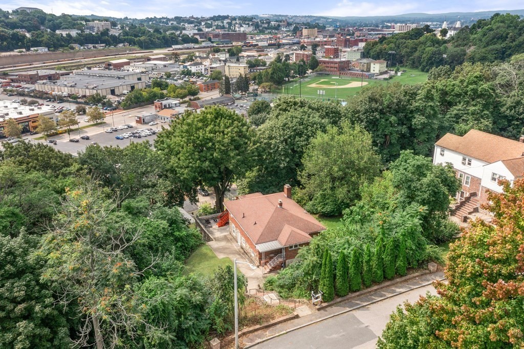 3 Wilson Street Worcester, MA 01604 - Photo 38 of 42 an aerial view of residential house with outdoor space and trees all around