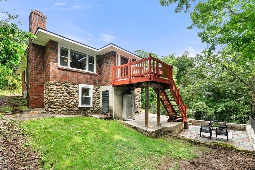 3 Wilson Street Worcester, MA 01604 - Photo 4 of 42 a front view of a house with garden
