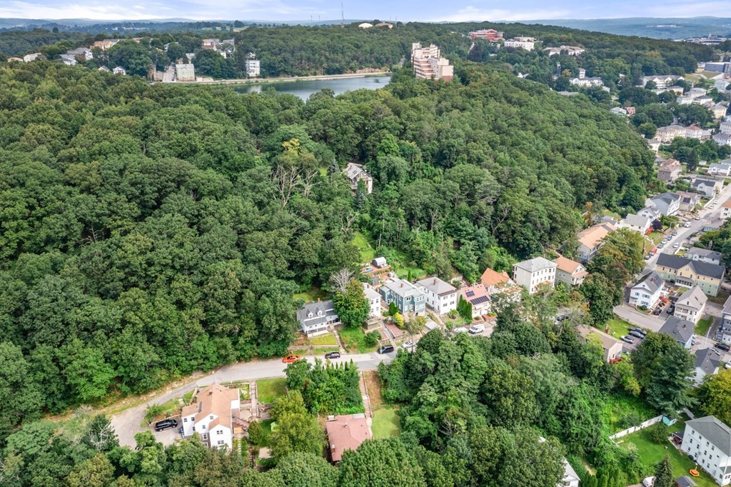 3 Wilson Street Worcester, MA 01604 - Photo 41 of 42 an aerial view of a city with lots of residential buildings and mountain view