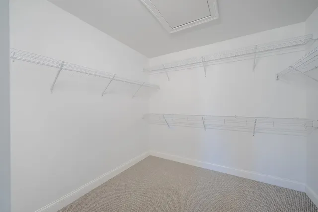a empty closet with white paint
