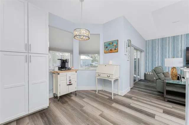 a view of a storage and utility room with a sink