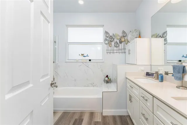 a bedroom with a large bed and a closet