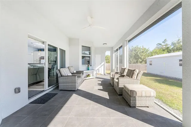 a view of a swimming pool with a yard