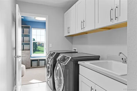 a utility room with dryer and washer
