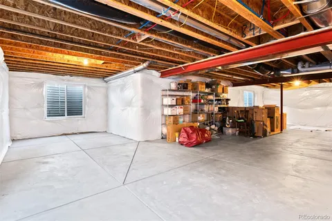 a view of a garage with parked cars