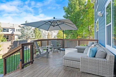 a view of balcony with couch and outdoor seating