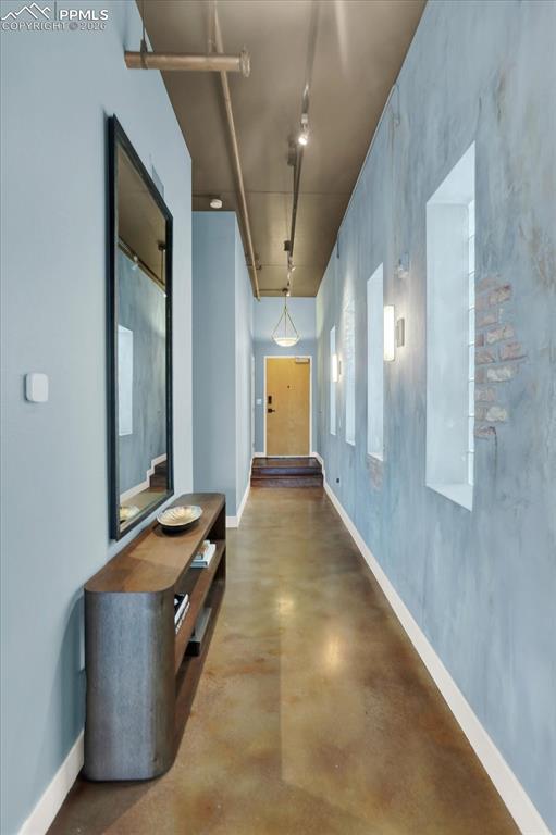 101 North Tejon Street, Unit 460 Colorado Springs, CO 80903 - Photo 3 of 49 a view of lobby with mirror